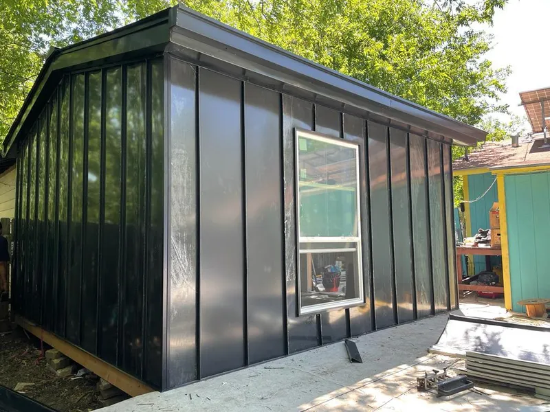 Black standing seam metal wall panels for Roof Inspection in Chino